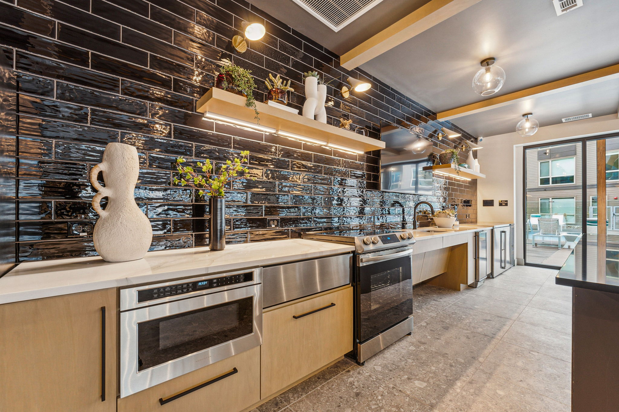 https://www.ardenapartments.com/wp-content/uploads/2024/12/Arden_Amenity_Kitchen_12.24.jpg